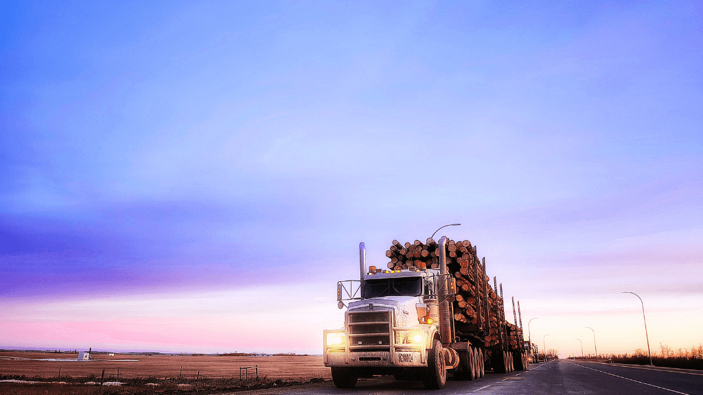 truck driving in sunrise